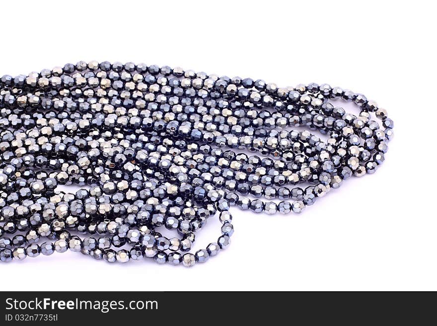 Blue beads  on white background