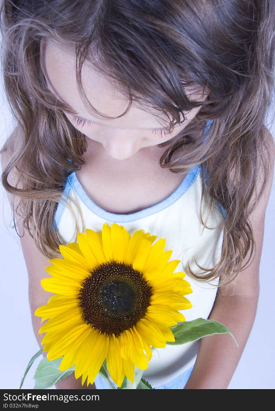 Little girl with flowers