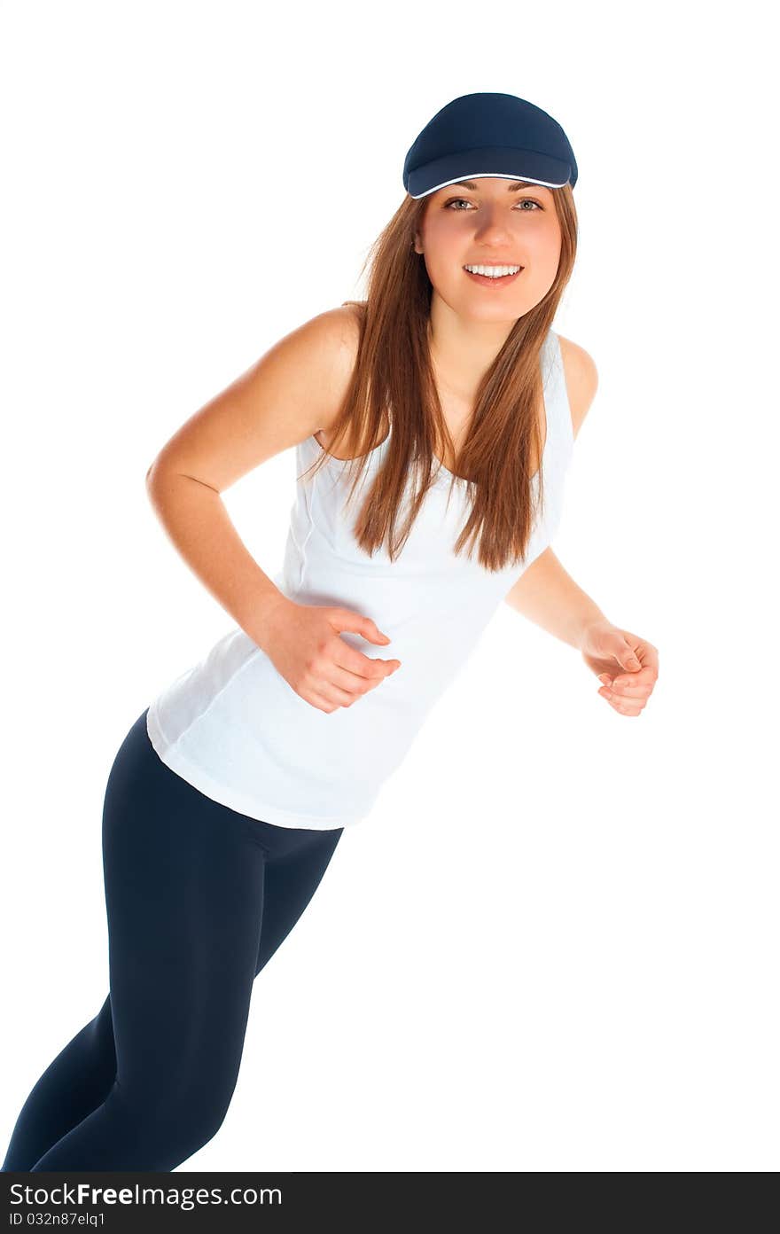 Beautiful woman with a sports cap on a white background