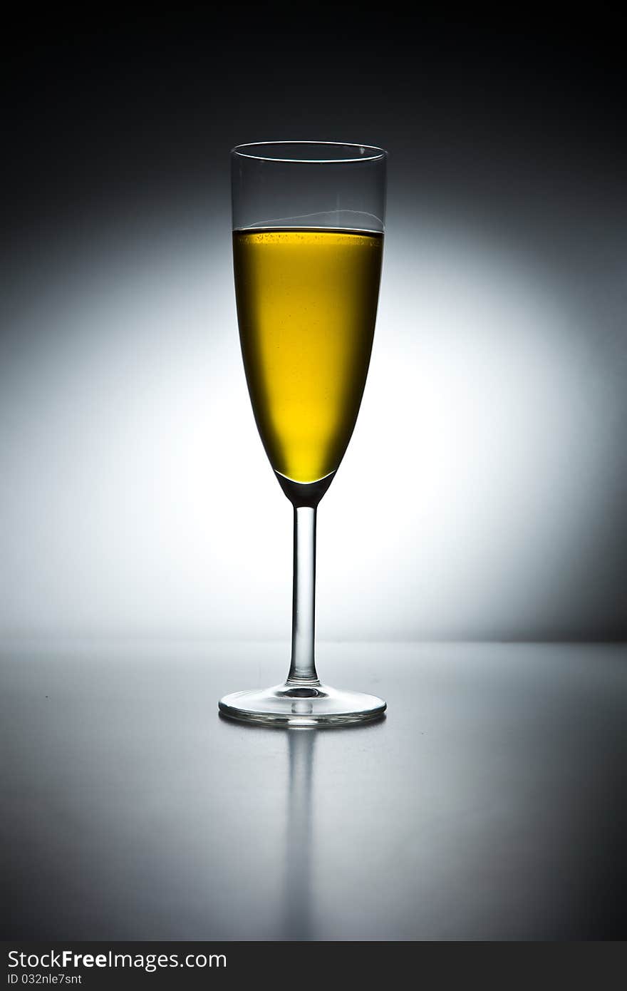 Glass of champagne with backlight