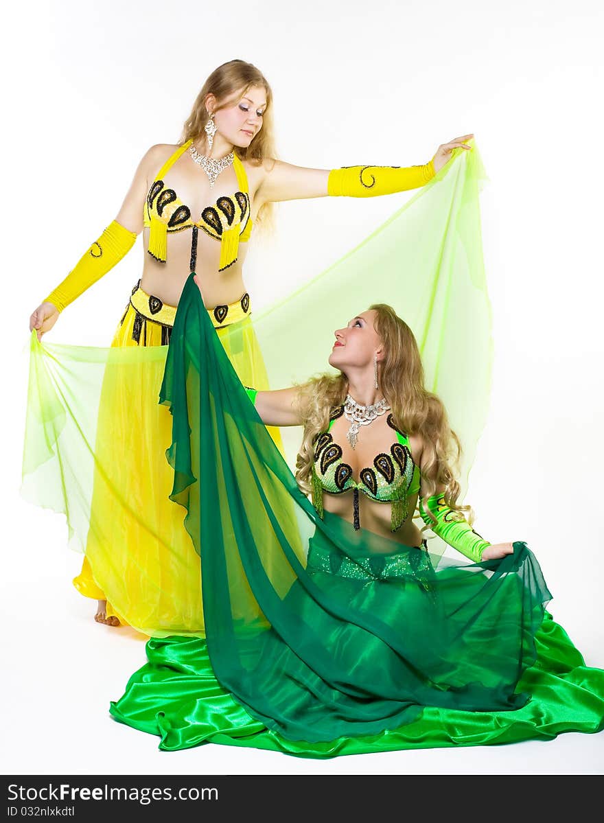 Two girl dance with veil