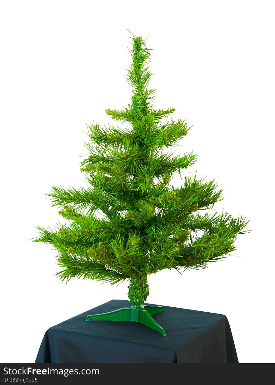 Artificial christmas tree isolated on white background. Artificial christmas tree isolated on white background