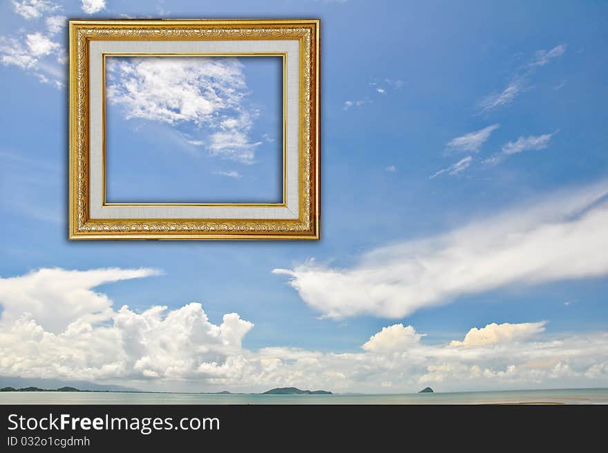 Gold Picture Frame on Blue Sky Background