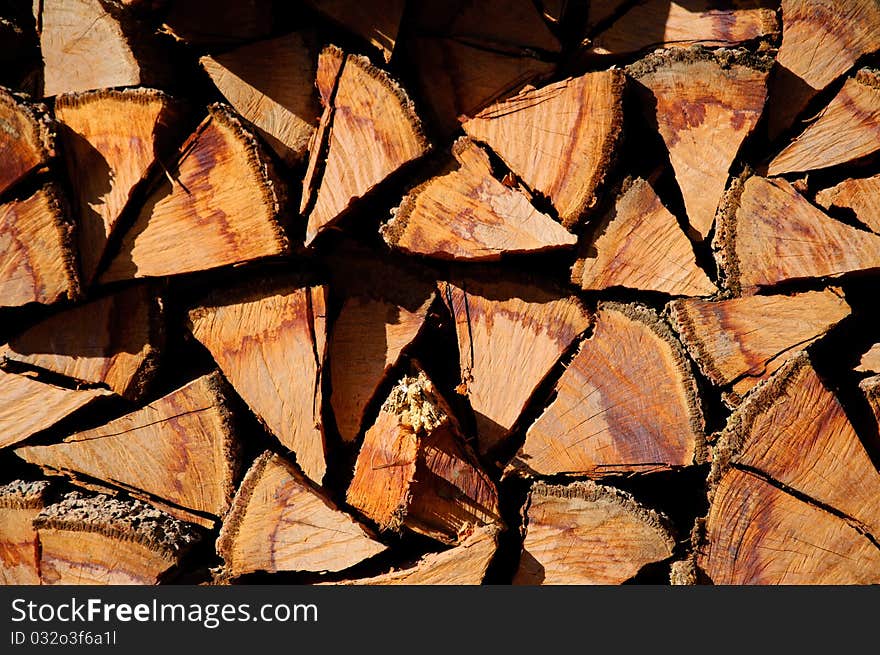 Stacked logs background with triangle shape