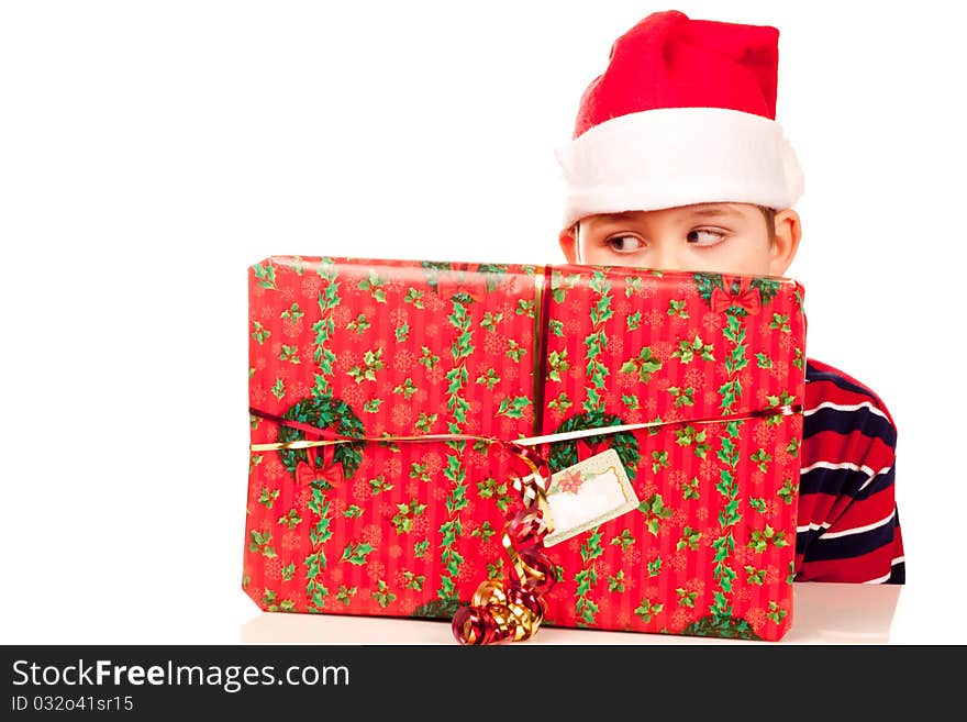 Christmas boy and a large present. Christmas boy and a large present