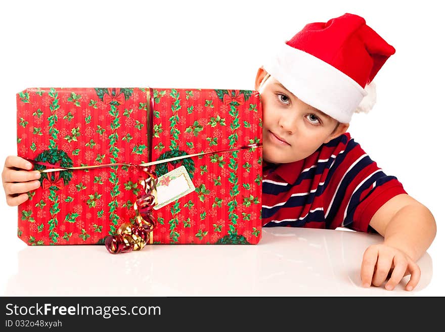 Christmas boy and a large present. Christmas boy and a large present