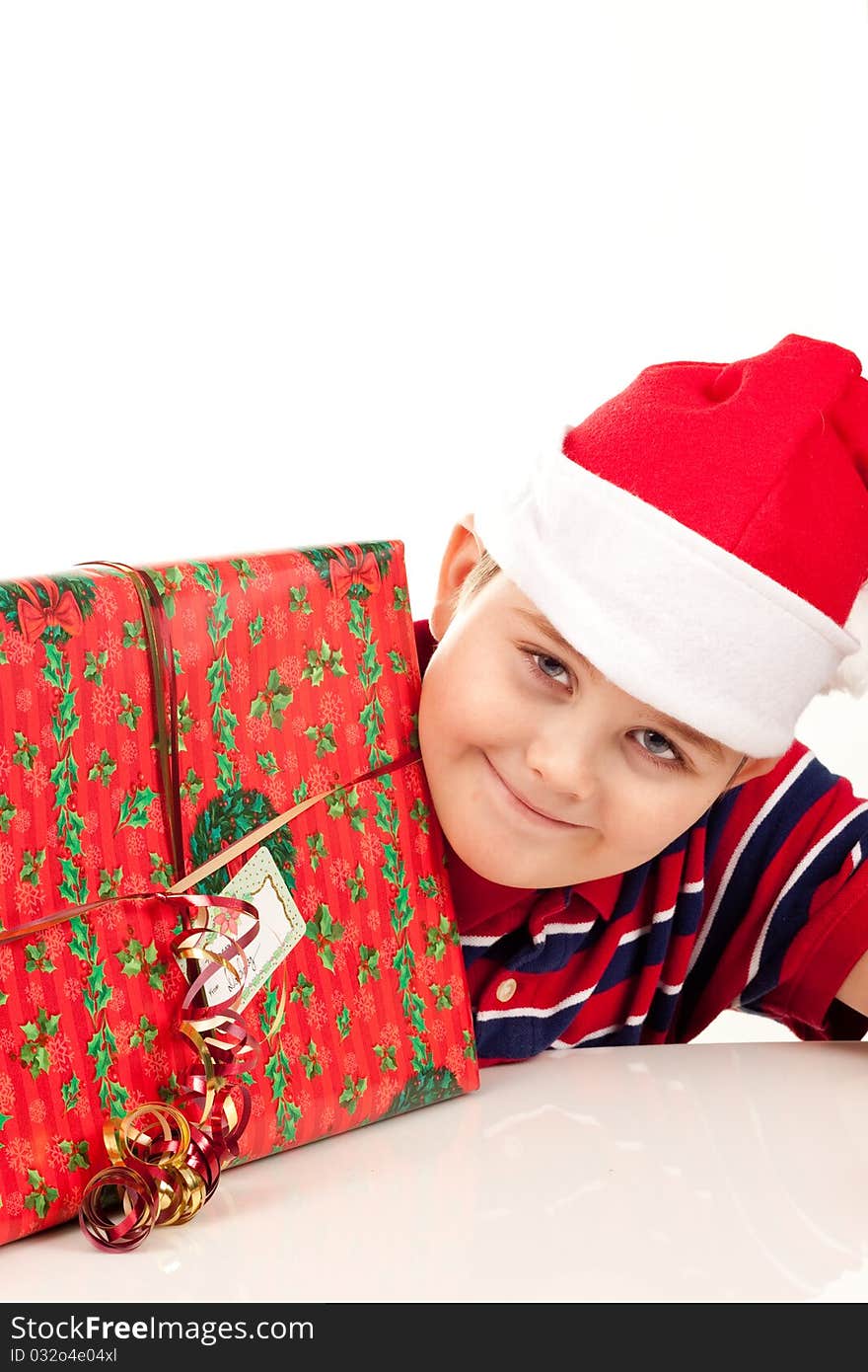 Christmas boy and a large present. Christmas boy and a large present