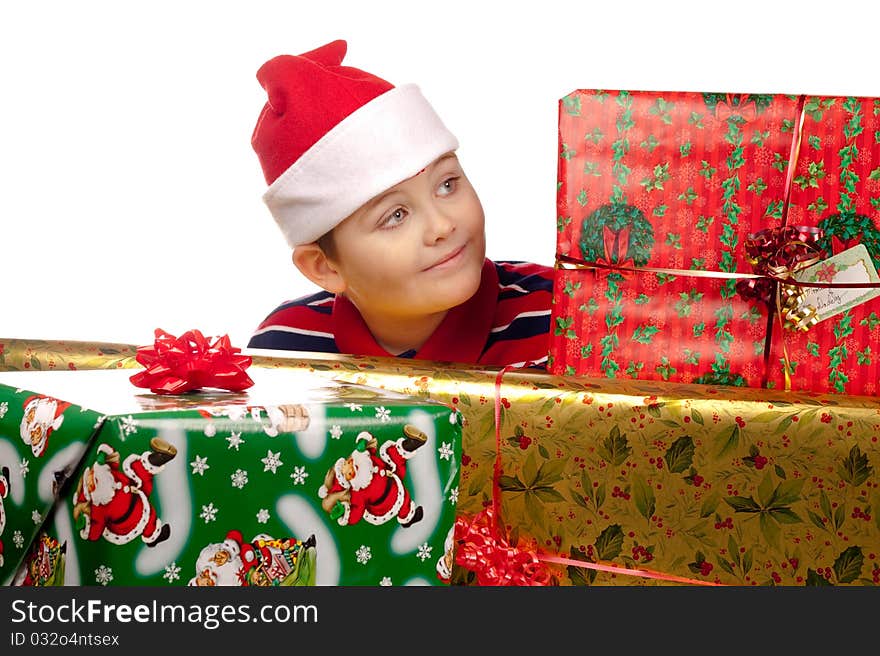 Christmas boy and large presents. Christmas boy and large presents