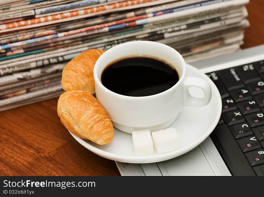 Cup from coffee and the newspaper still life