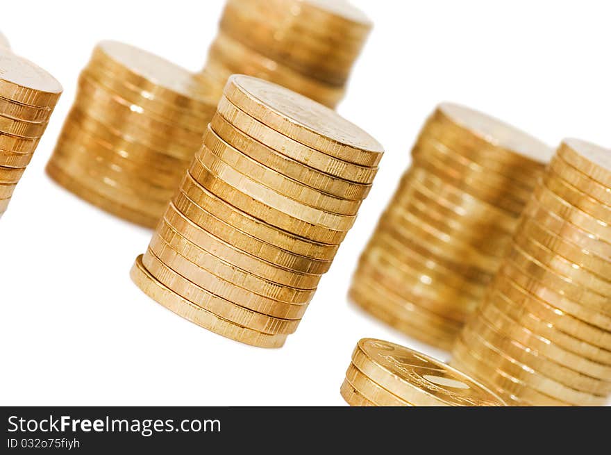 Golden coins isolated over white