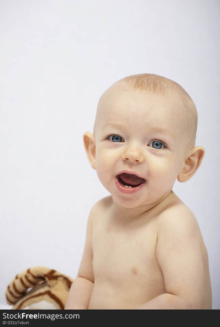 Broad smile of a 12 month old baby. Broad smile of a 12 month old baby