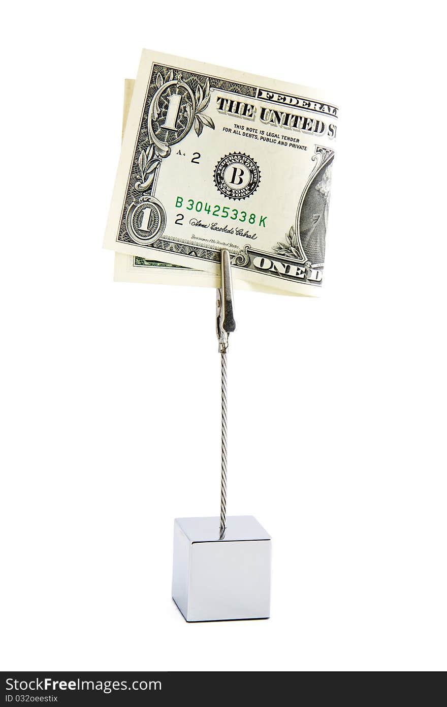 Small office desk stand with one american dollar banknote isolated on white. Small office desk stand with one american dollar banknote isolated on white