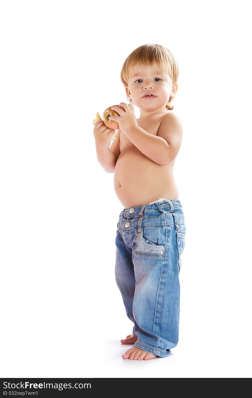 Little boy with an apple on a white background