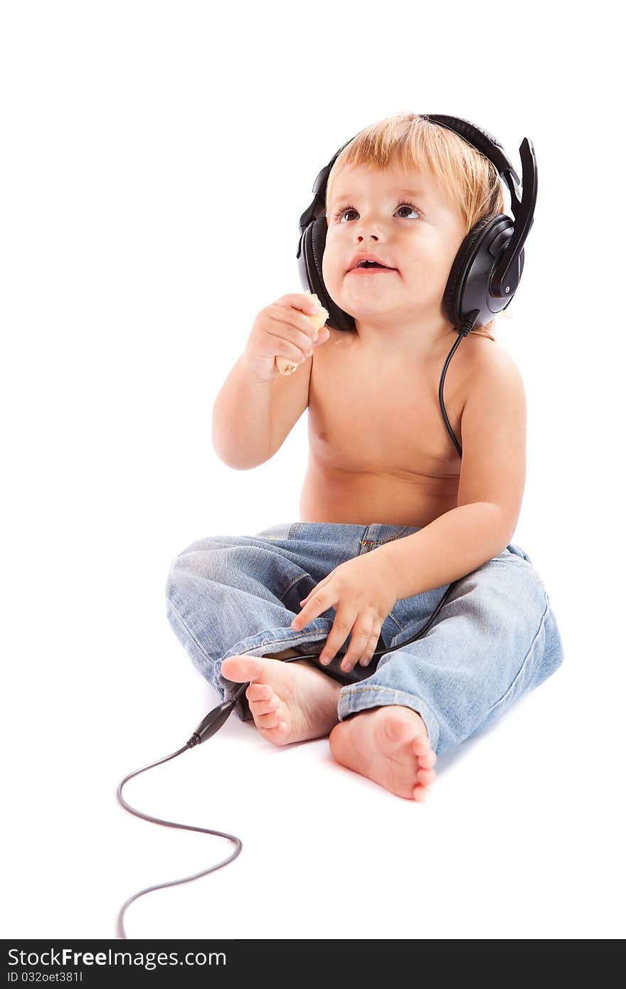 Child with headphones isolated on white