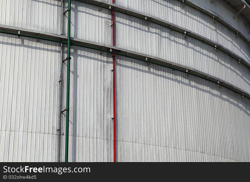 The storage tanks at an oil refinery complex. The storage tanks at an oil refinery complex