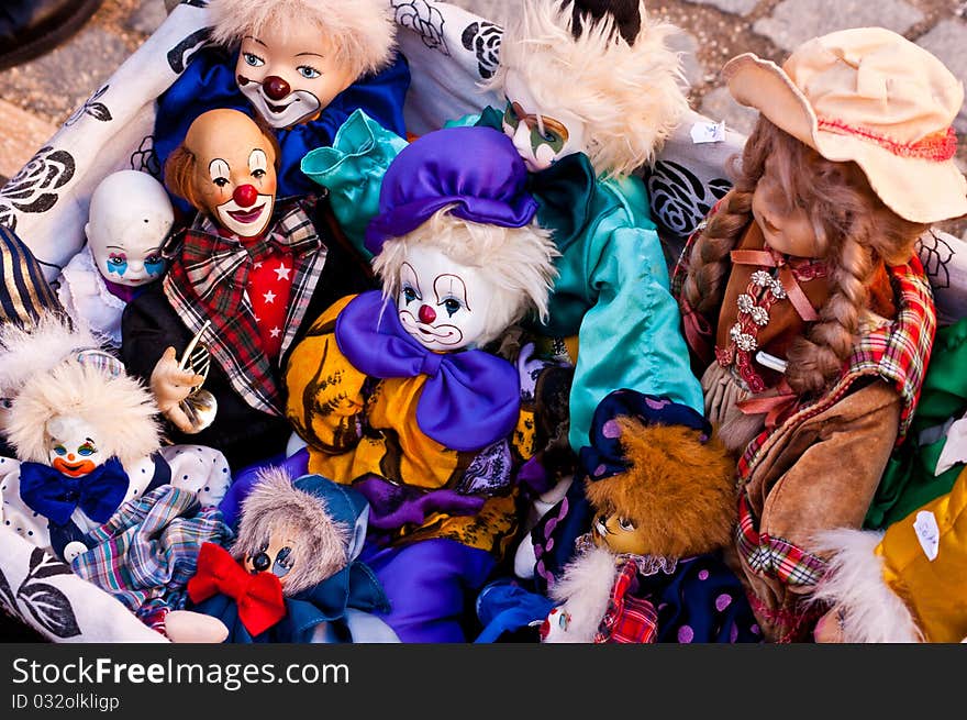 Lots of colorful puppets and toys representing circus clowns. Lots of colorful puppets and toys representing circus clowns