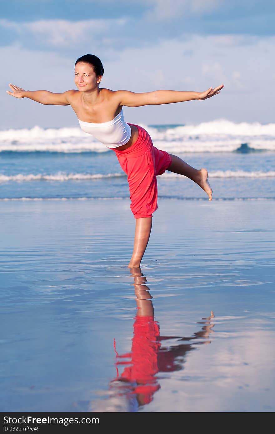 Beautiful woman relaxing by the seaside. Beautiful woman relaxing by the seaside