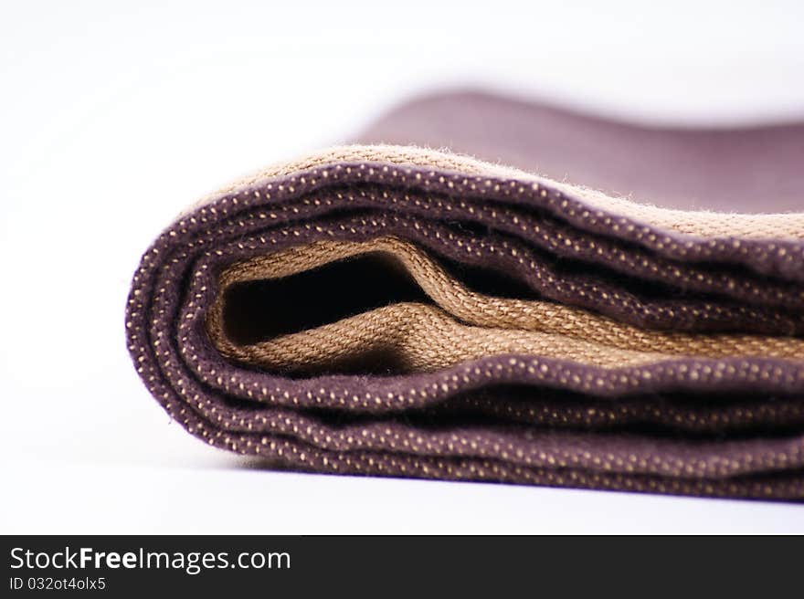 brown bath towel on white background