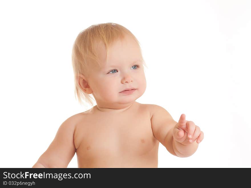 Portrait of calm young sitting baby pinting with finger. Portrait of calm young sitting baby pinting with finger