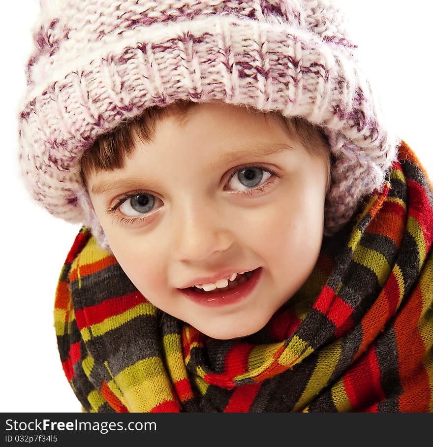 Happy little girl winter portait isolated