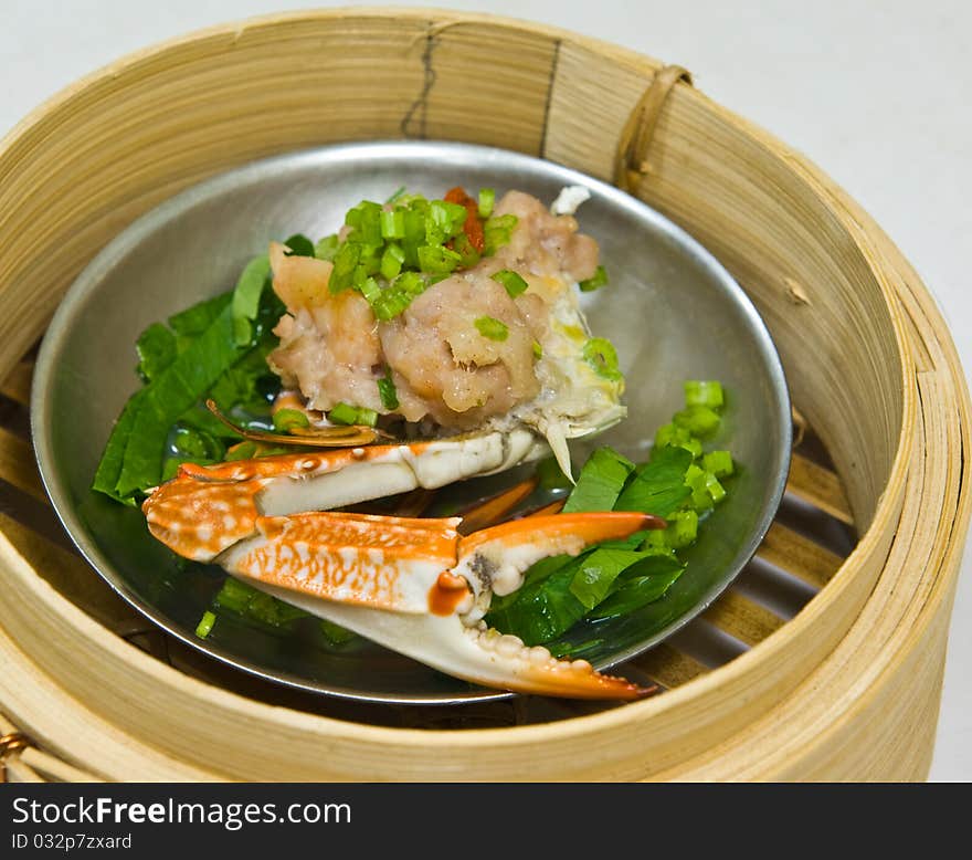 Chinese steamed dimsum in bamboo containers traditional cuisine. Chinese steamed dimsum in bamboo containers traditional cuisine