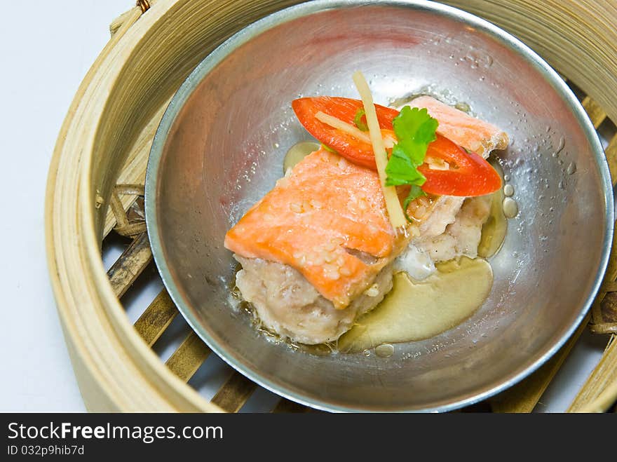 Chinese steamed dimsum in bamboo containers traditional cuisine. Chinese steamed dimsum in bamboo containers traditional cuisine