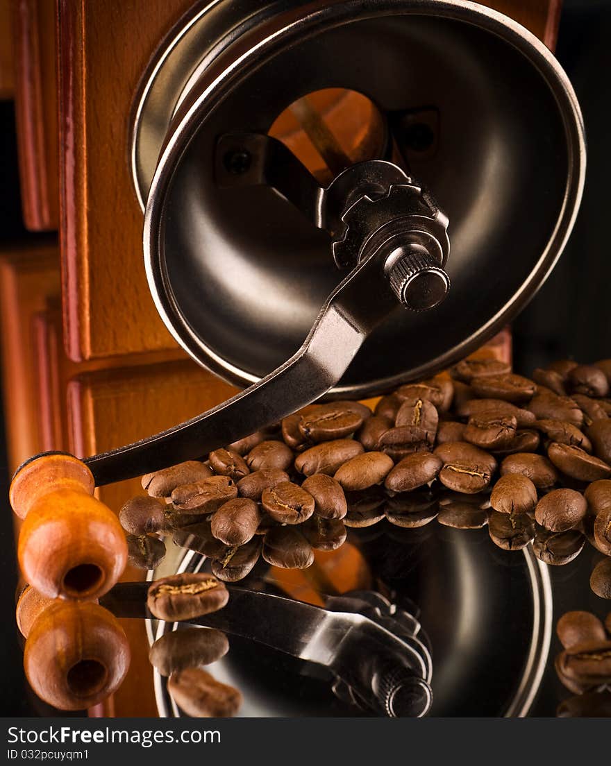 Manual coffee mill with coffee beans. Manual coffee mill with coffee beans