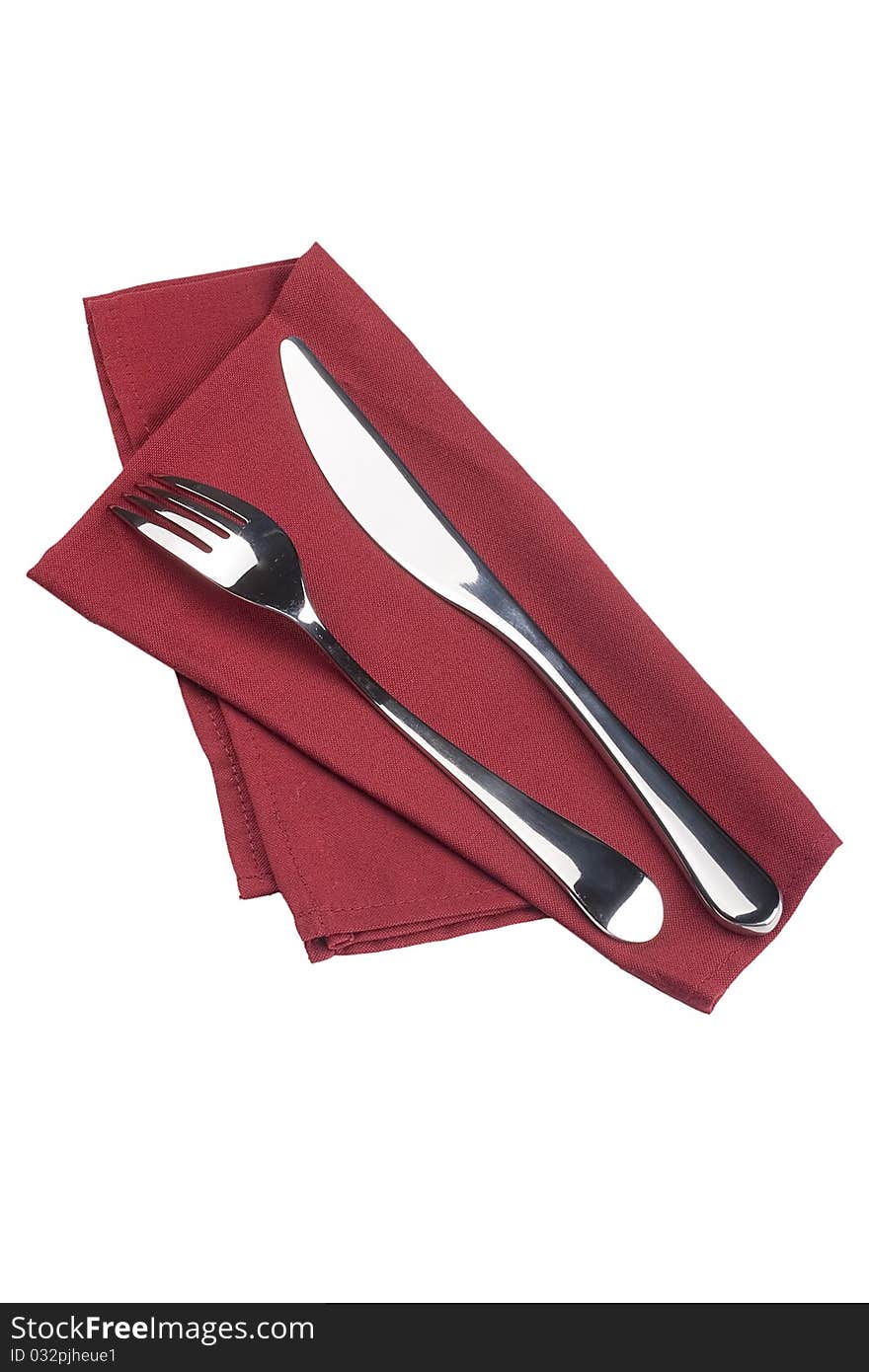 Knife and fork on a napkin as a dining room serving.