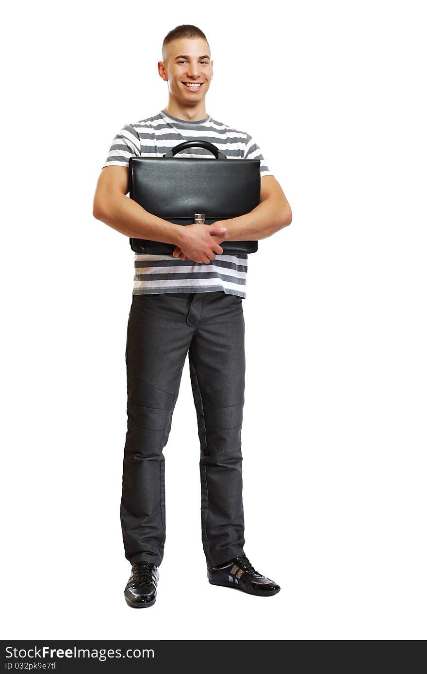 Young handsome man posing with suitcase