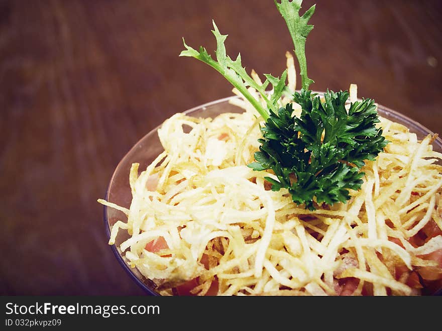 Salad with crunchy potato in glass. Salad with crunchy potato in glass