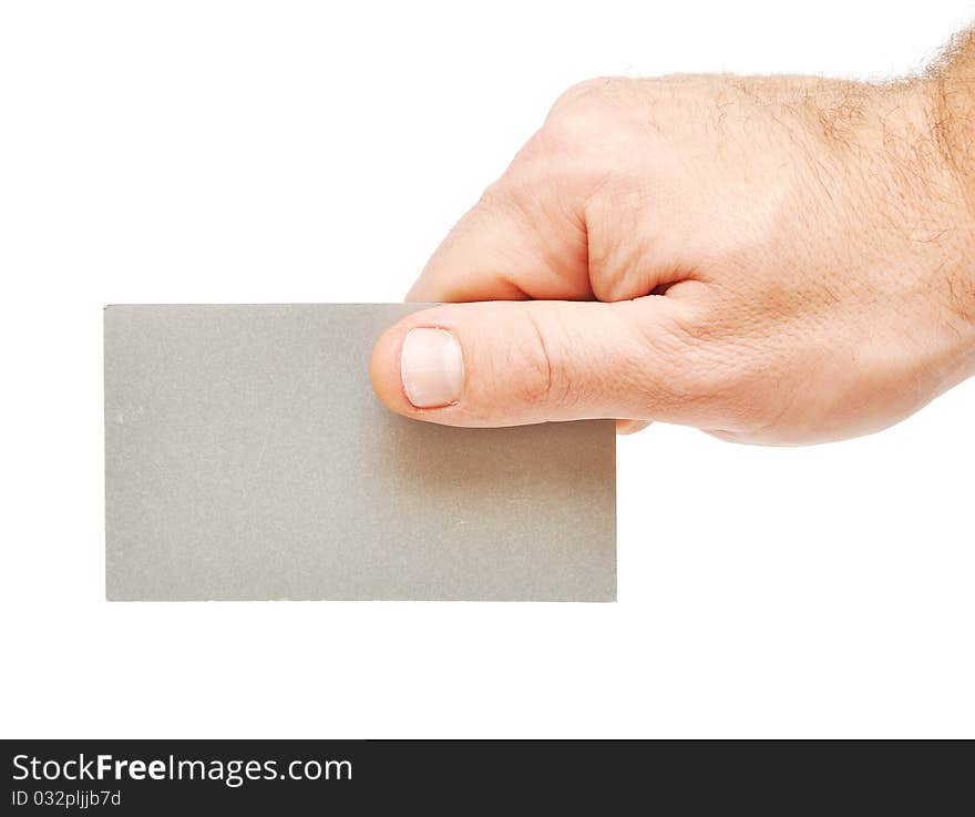 Closeup image of businessman's hand holding blank paper business card on white. Closeup image of businessman's hand holding blank paper business card on white