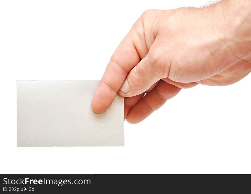 Closeup image of businessman's hand holding blank paper business card on white. Closeup image of businessman's hand holding blank paper business card on white