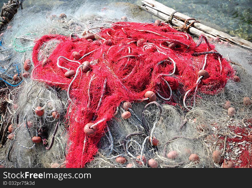 Red fishing net. Sardinia. Italy.