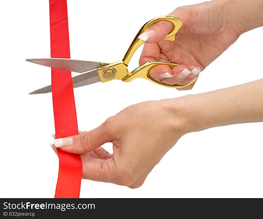 Hands of woman with scissors and red line isolated