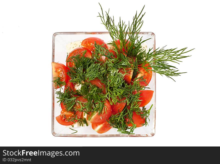 Salad from fresh vegetables on a white background