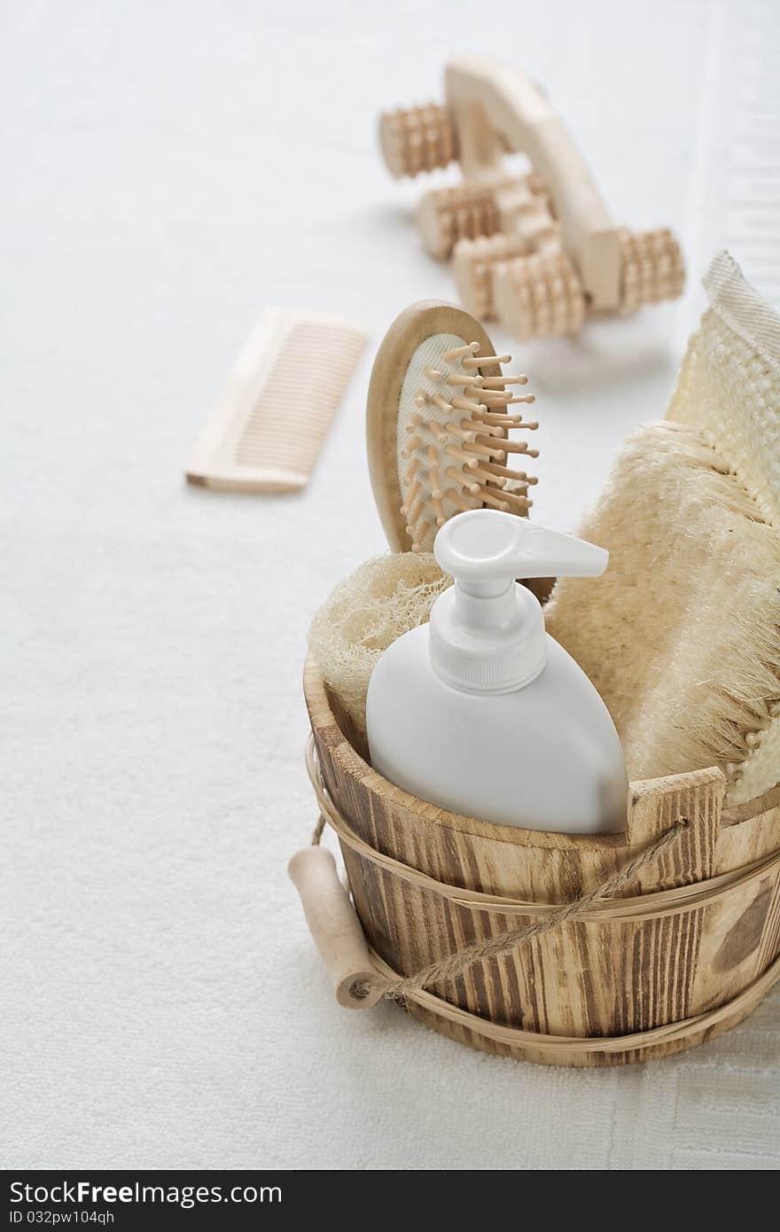 Big collection of objects for bathing on white towel