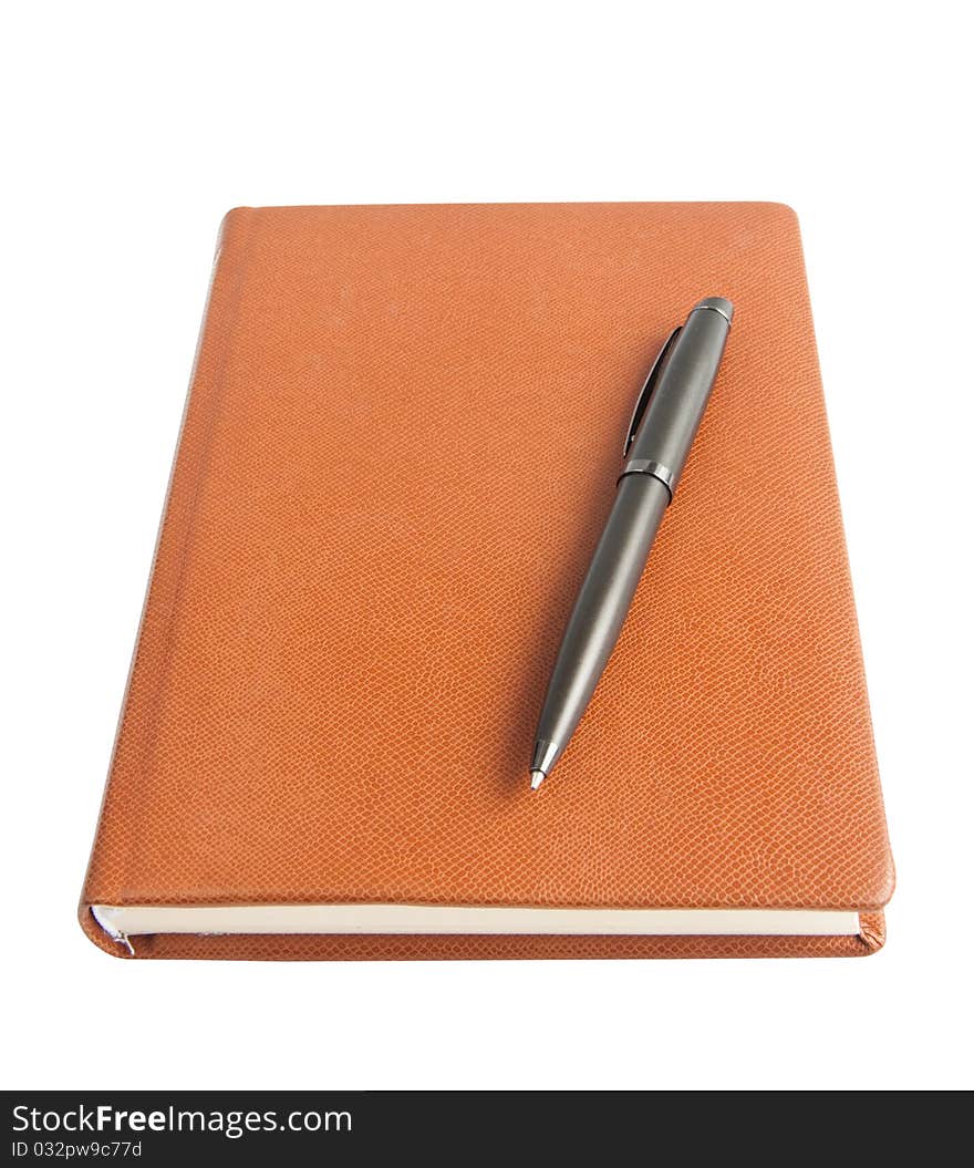 Diary and a pen on a white background