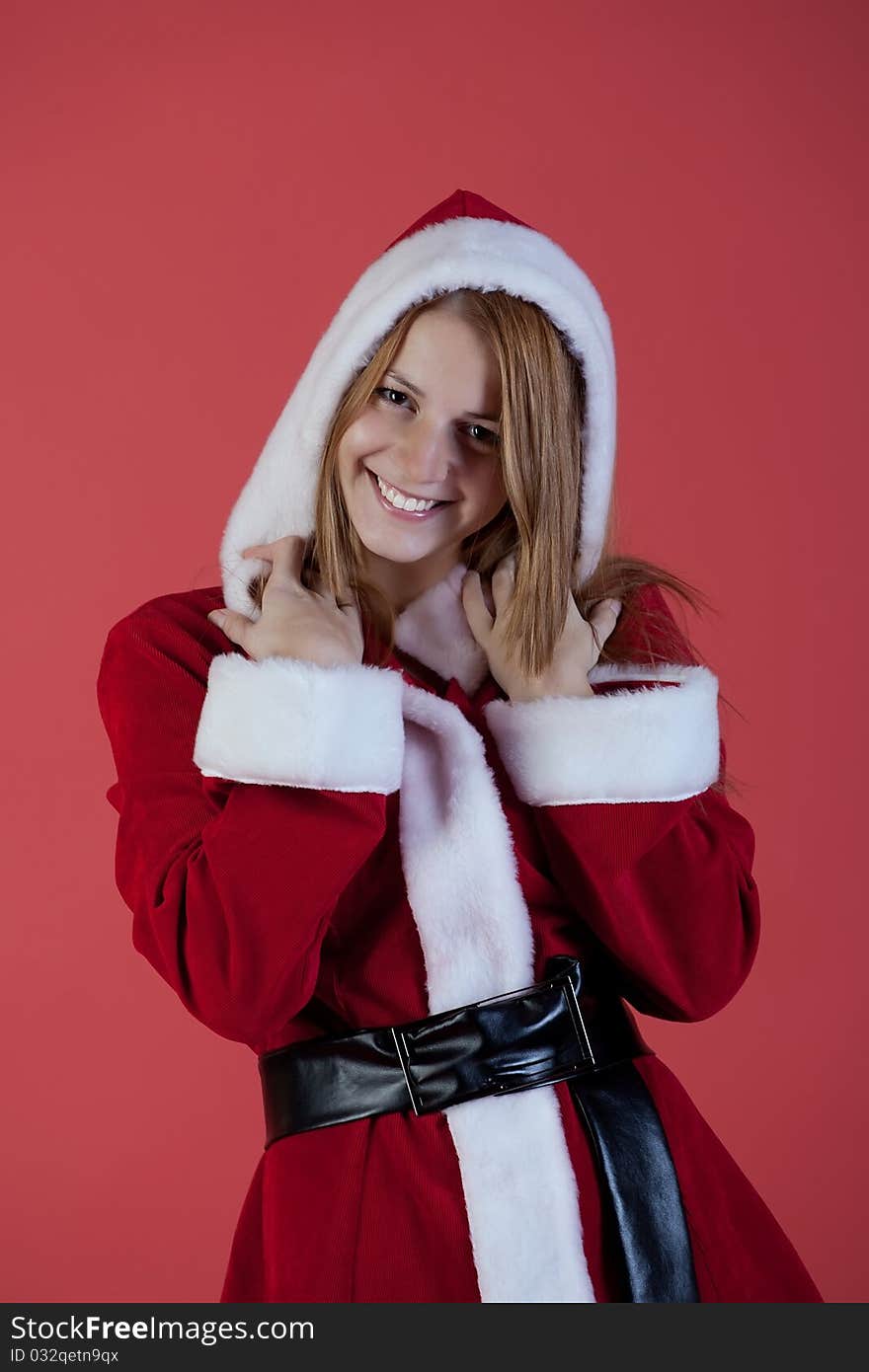 Christmas girl on red background