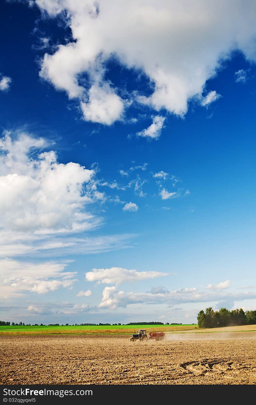 Agricultural processing with one tractor on empty field