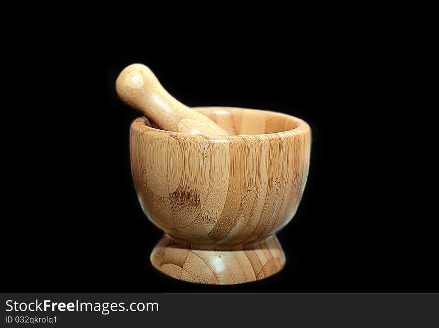 Wooden mortar and pestle for grinding dry food. Wooden mortar and pestle for grinding dry food