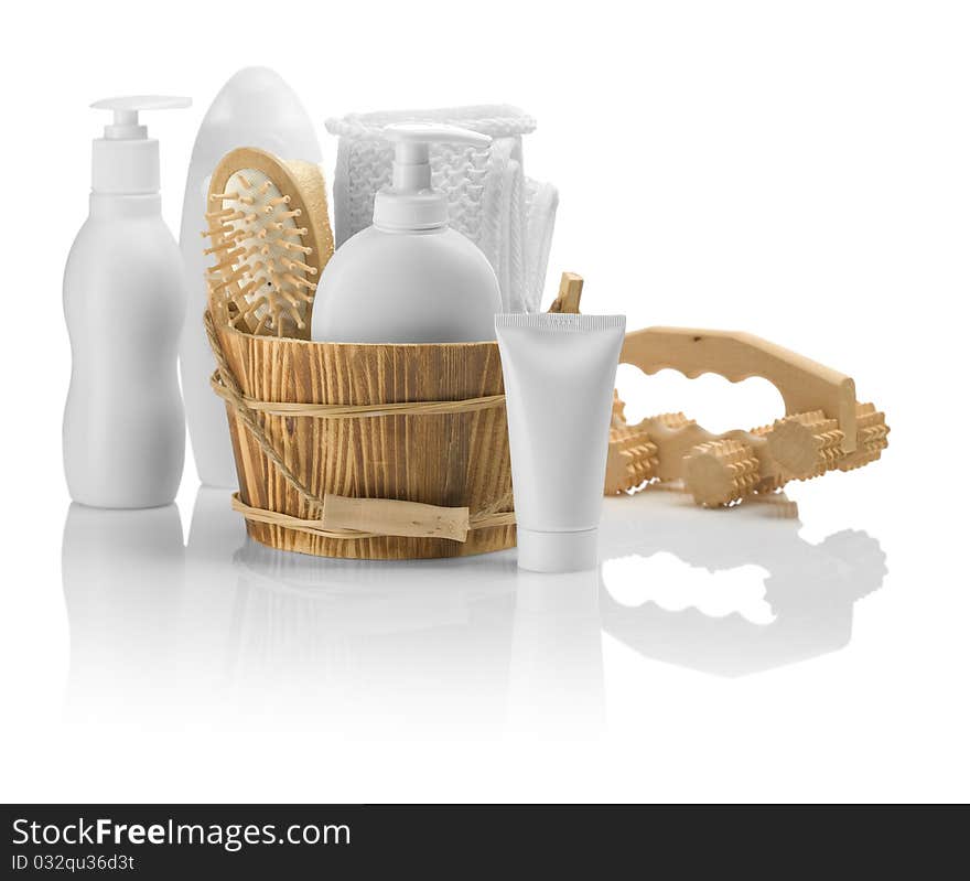 Set of white and brown. plastical and wooden bathing accessories isolated on white background. Set of white and brown. plastical and wooden bathing accessories isolated on white background