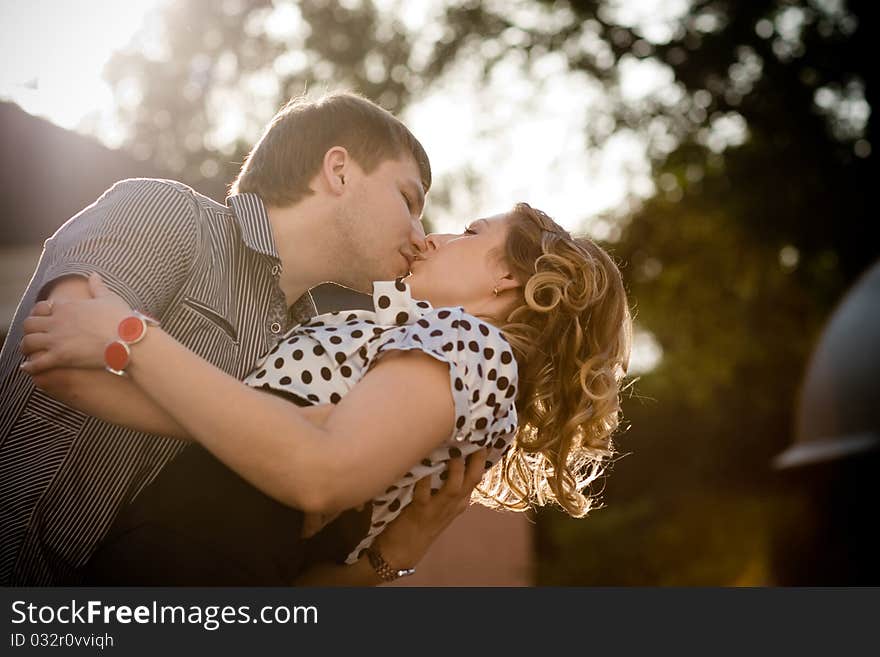 Exciting kiss of a young beautiful couple. Exciting kiss of a young beautiful couple