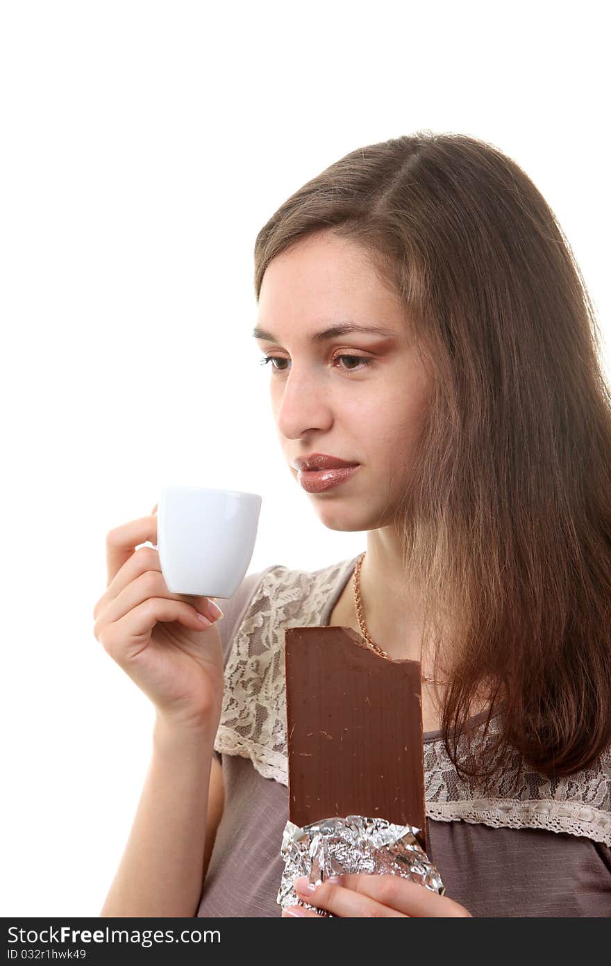 Woman drink coffee with a chocolate