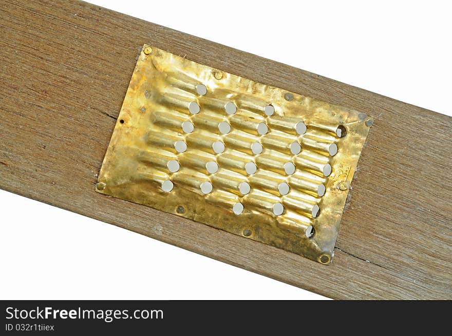 A Retro Grater Made Of Wood And  Brass. A Retro Grater Made Of Wood And  Brass