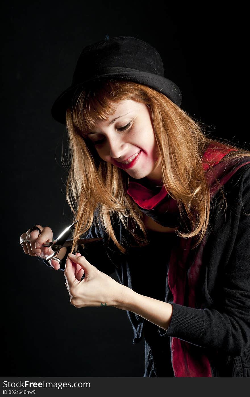 Dark girl with red scarf and black hat rusty scissors