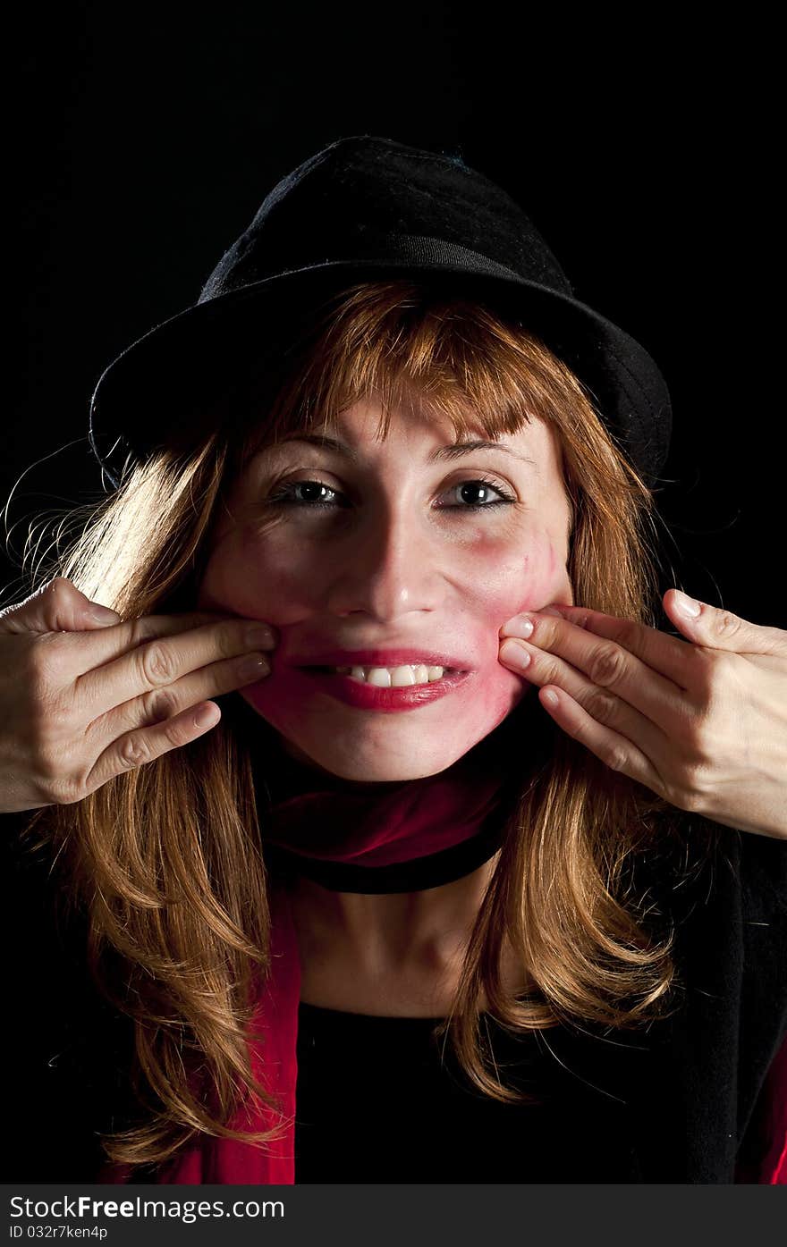 Girl with hat and lipstick deformed her face