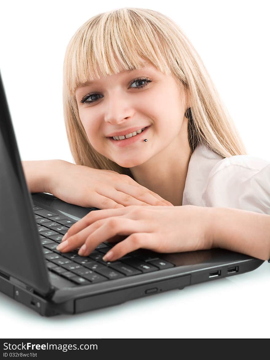 Smiling young girl with laptop