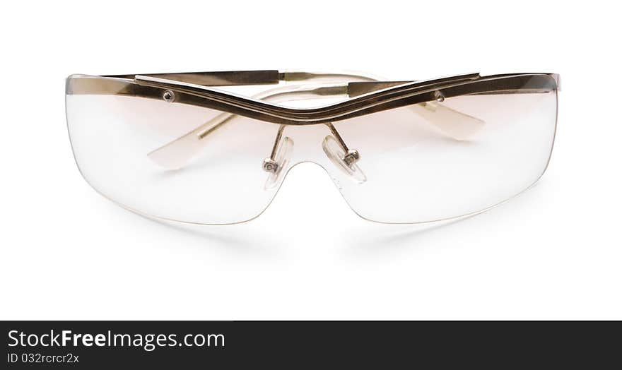 Transparent brown glases isolated on a white background