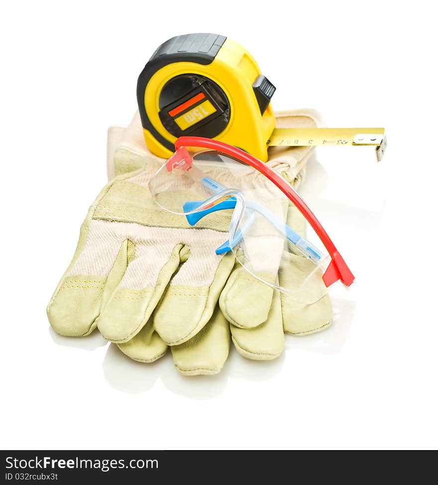 Glasses and tapeline on gloves isolated on white background