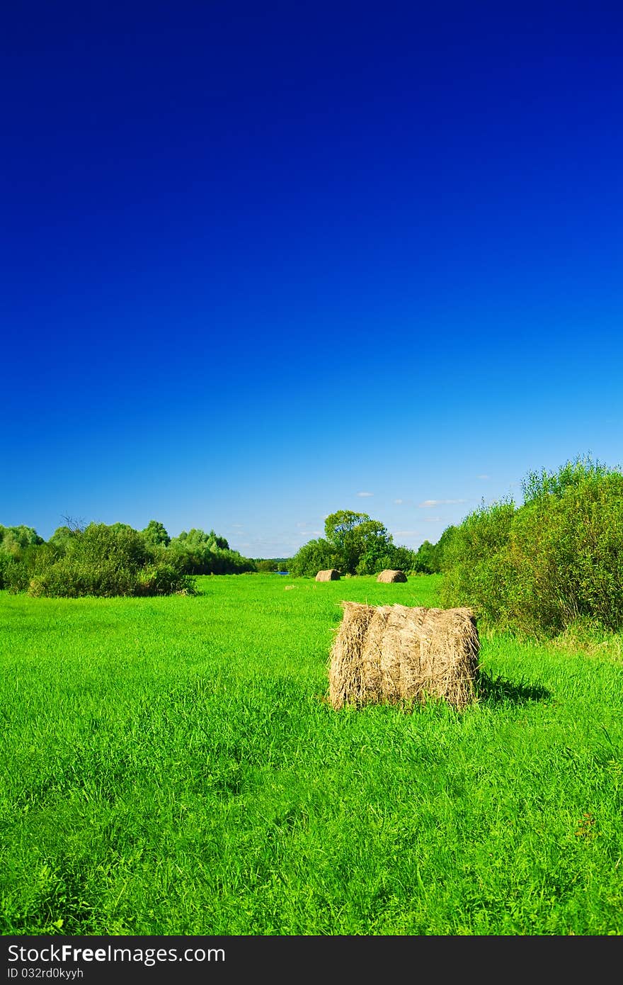 Haystack On A Green Field